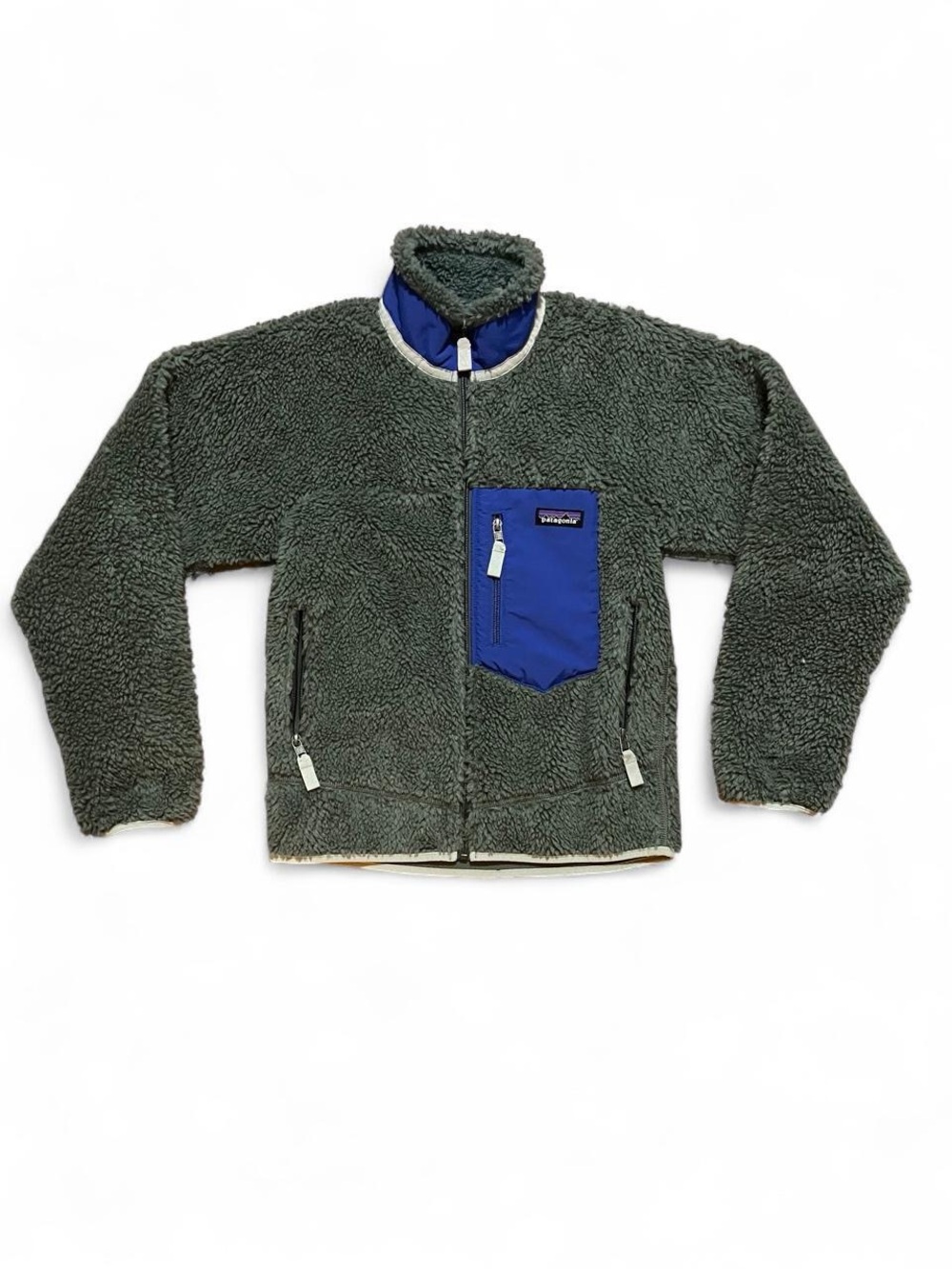 Patagonia women’s Green Fleece Jacket with Blue Chest Pocket